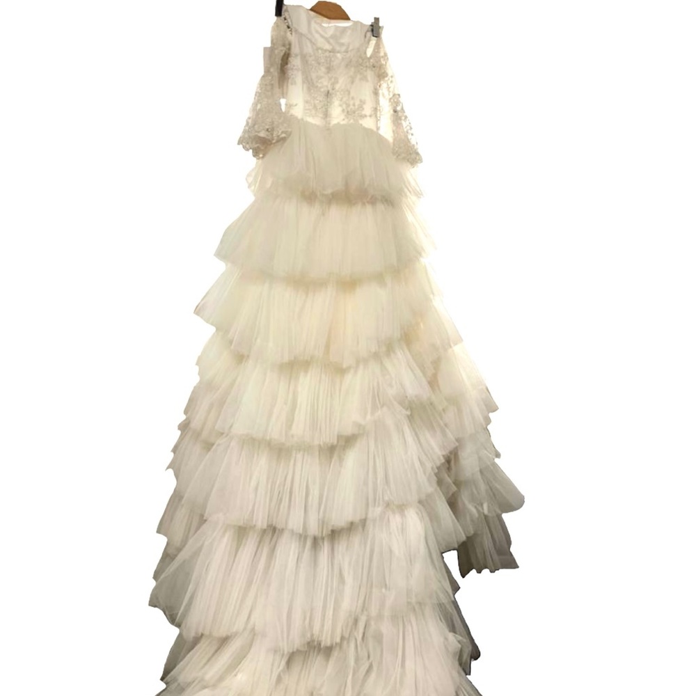 Weeding dress,top cover fill with beads ,looking precious.